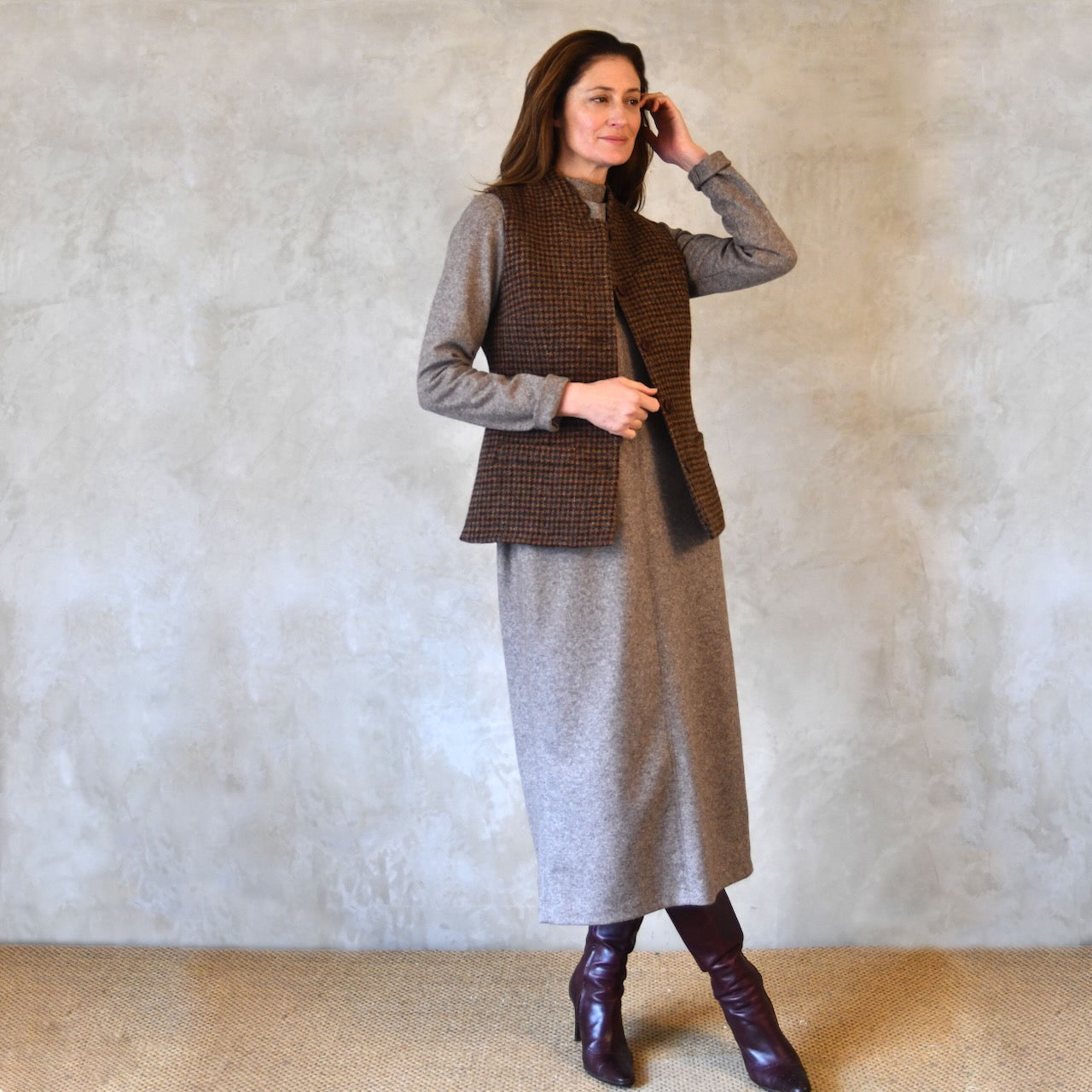 Ladies Classic Cut Tweed Gilet. Bespoke Gilets, handmade in London. Shown in Copper Check Tweed from Lovat Tweed. Side Shot.
