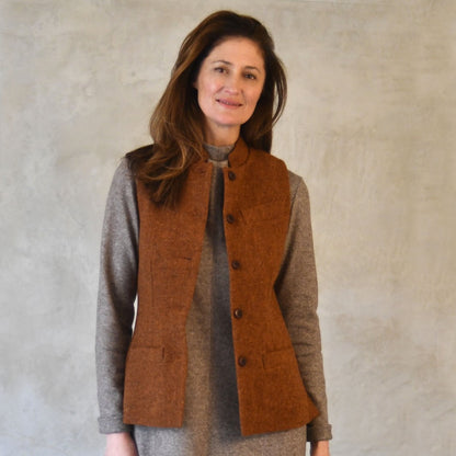 Ladies Classic Cut Tweed Gilet. Bespoke Gilets, handmade in London. Shown in Plain Russet Tweed from Lovat Tweed. Front Open View Shot.
