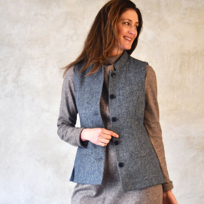 Yorkshire Tweed Gilet modelled over brown jumper. Handmade in London. Entirely made in Great Britain.