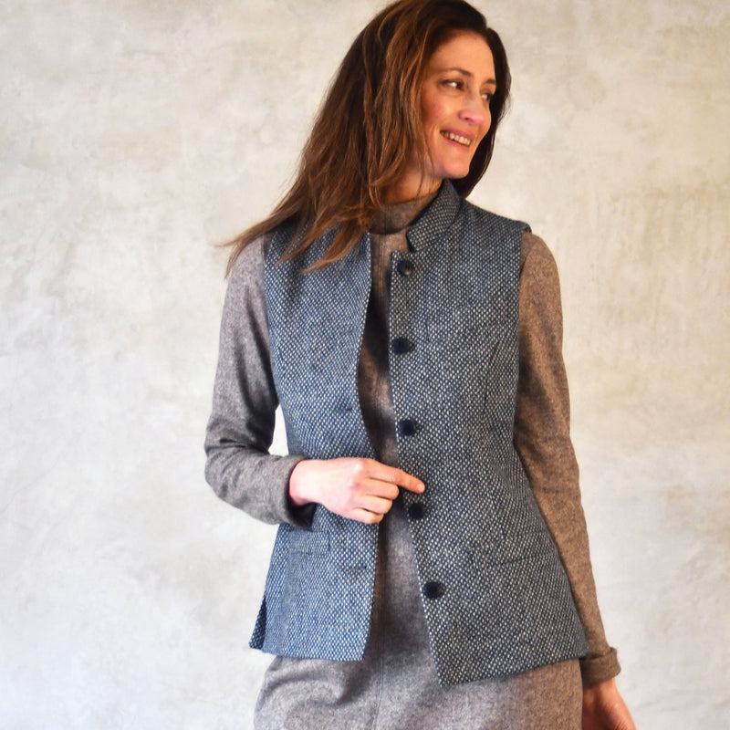Yorkshire Tweed Gilet modelled over brown jumper. Handmade in London. Entirely made in Great Britain.