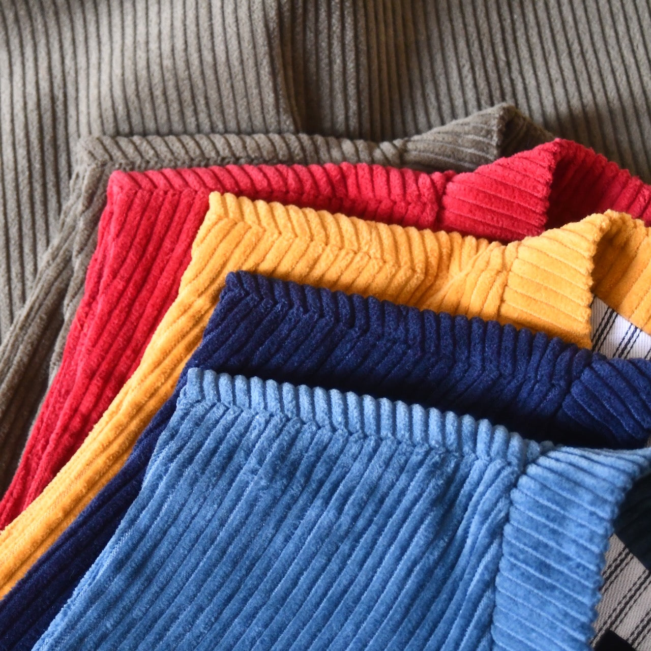 British Made Gilets in Pure Cotton Corduroy. Bespoke Waistcoats in Teal Cord, Navy Cord, Ochre Cord, Crimson Cord and Khaki Cord.
Entirely made by hand in East London.