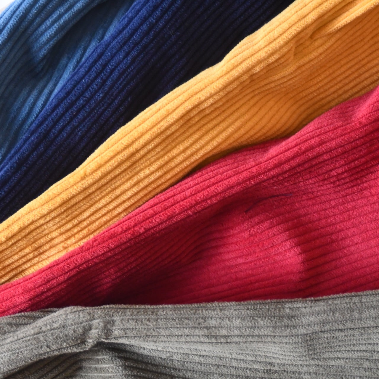 British Made Gilets in Pure Cotton Corduroy. Bespoke Waistcoats in Teal Cord, Navy Cord, Ochre Cord, Crimson Cord and Khaki Cord.
Entirely made by hand in East London.