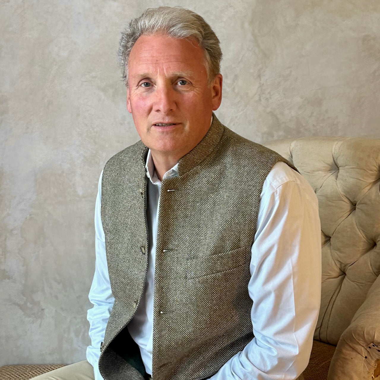 Nehru Style Gilet in a Hopsack patterning that gives the overall effect of a misty green. With a weight that will take you from early autumn through until late Spring, this smart tweed will quickly pay its way.
Lined in Cotton Ticking this waistcoat has Flat Horn buttons and a Mandarin collar.
A superb alternative to a jacket or jumper for the cooler days and nights with a slim, tailored cut and ample pocket space. Warm and easy to wear, it will work as well inside 