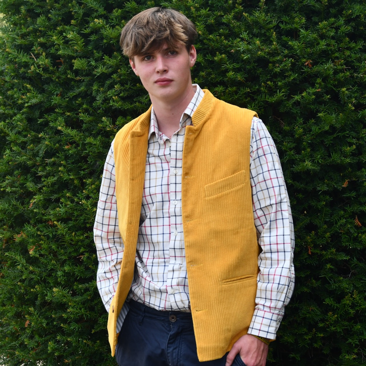 Nehru Style Gilet in Ochre Cotton Corduroy. This loose fit waistcoat is handmade in London.