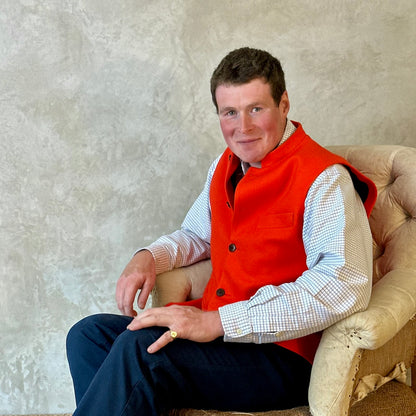 A bright orange Nehru Style Gilet in pure merino wool flannel. Woven in Yorkshire this merino melton has a wonderful handle and a lovely warm weight to it. Handmade in London, this gilet has three outer and two inner pockets and side vents for ease when seated.
Cut,  Made and Finished by Hand in London. Woven in Yorkshire, with buttons from Gloucestershire - a truly British Waistcoat.