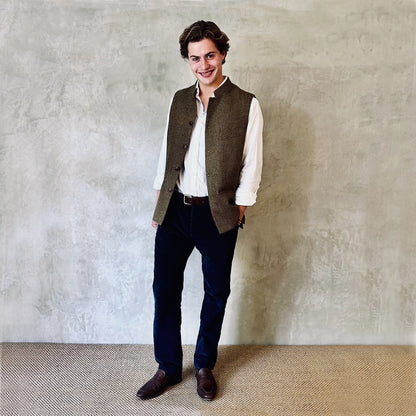 A Stunning patterned tweed Nehru-stle gilet, perfect for the city or country. this finely oven Yorkshire Tweed has a rich orange, green and brown patterning – subtle and very very smart. Handmade in London. Full View.