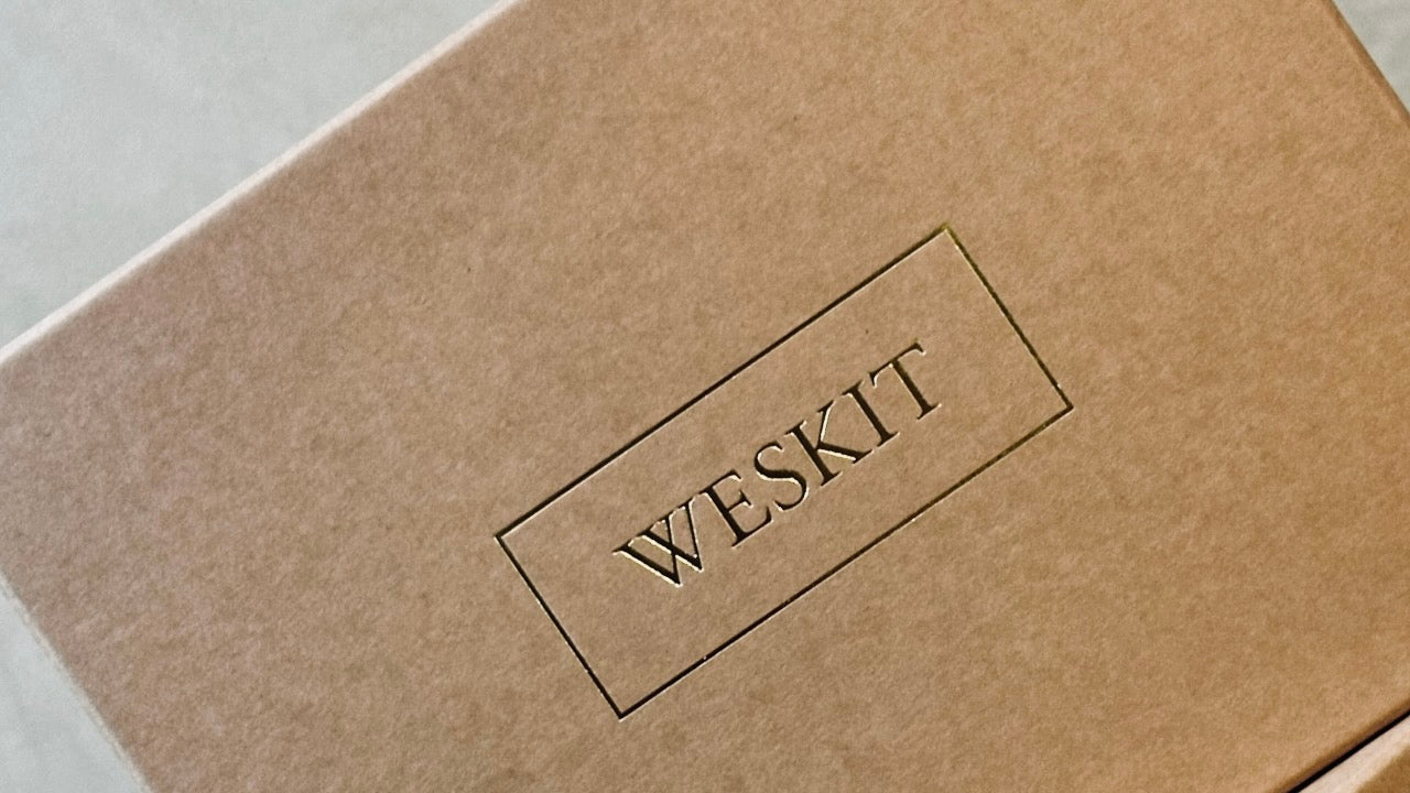 Handmade Stapled Compostable Boxes, Made in London for Weskit. Packaging for Weskit Gilet. Entirely made in Great Britain.