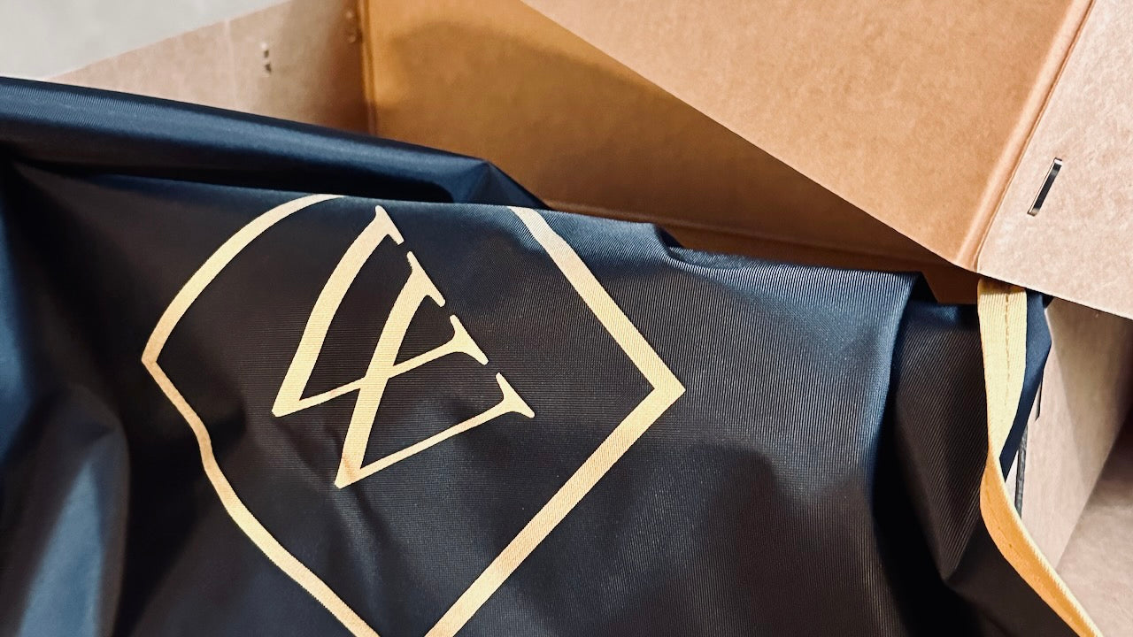 Midlands-Made Suit Carrier and Handmade Stapled Compostable Boxes, Made in London for Weskit.