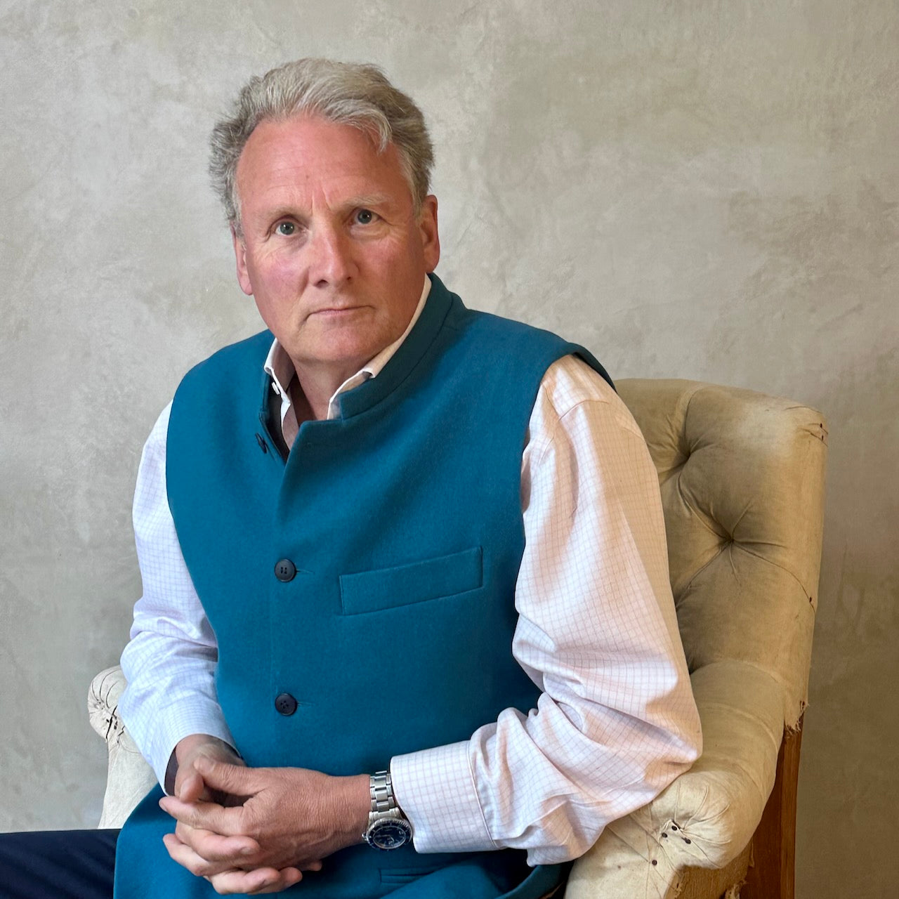 A superb and wonderfully warm alternative to a jacket for autumn winter in a luxurious pure merino wool flannel with a neat cut and ample pocket space. Woven in Yorkshire. Handmade in London. Buttons from Courtney & Co in Gloucestershire.