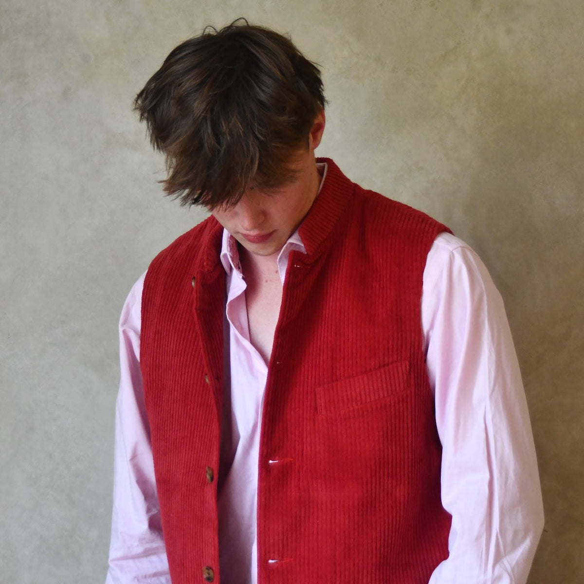Bespoke Nehru Style Gilet in Crimson Cord.
Handmade in London.
Shown with a Nehru Collar over a pink shirt.