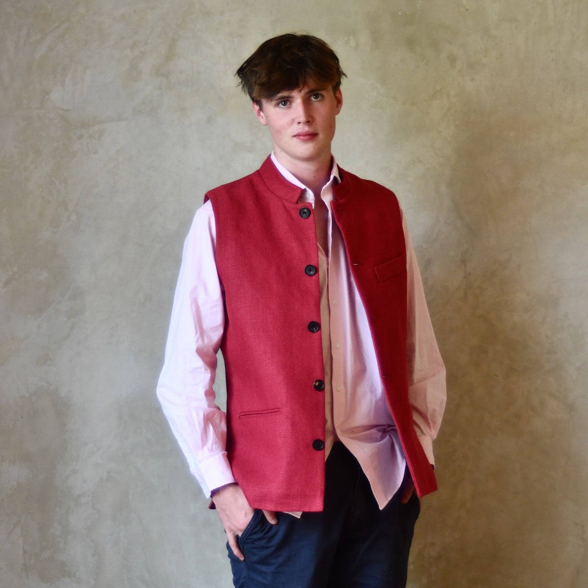 Red Linen Nehru-Style Fitted Gilet. Handmade in London. Bespoke and ready to ship. Shown worn open over a pink shirt.
