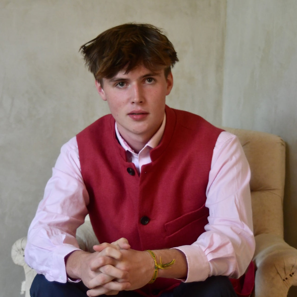 Red Linen Nehru-Style Fitted Gilet. Handmade in London. Bespoke and ready to ship. Shown buttoned over a pink shirt.