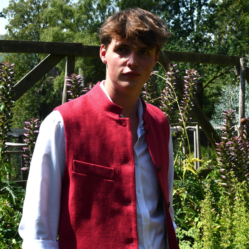 Red Linen Nehru-Style Fitted Gilet. Handmade in London. Bespoke and ready to ship. Shown unbuttoned over a blue shirt.