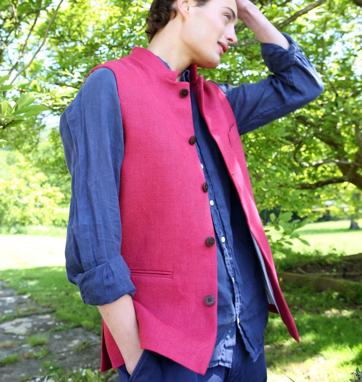 Red Linen Nehru Style Gilet. Handmade in London. Entirely made in Great Britain. Shown over blue Linen Shirt.