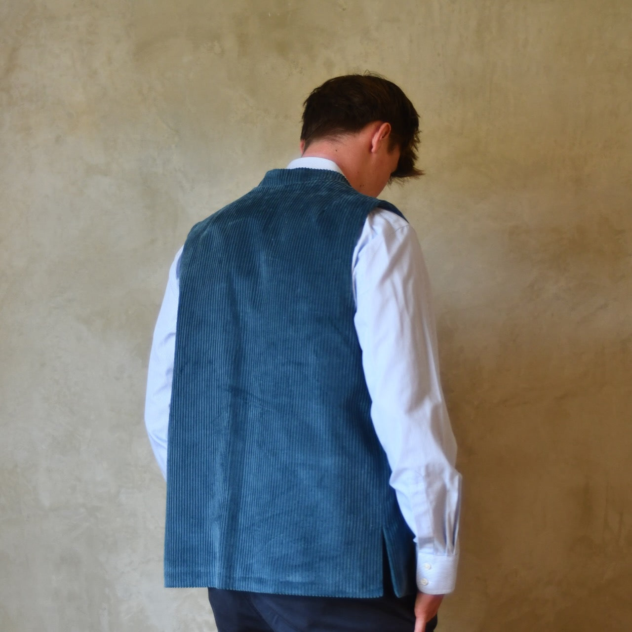 Rear View of Loose Fit Nehru Style Gilet in Teal Corduroy. This Bespoke pure cotton corduroy waistcoat is handmade in London.