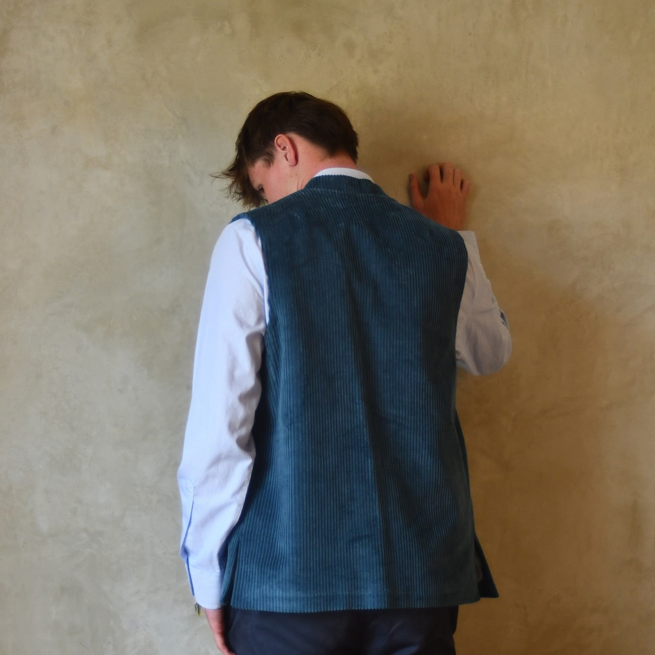 Back vewi of Loose Fit Nehru Style Gilet in Teal Corduroy. This Bespoke pure cotton corduroy waistcoat is handmade in London.