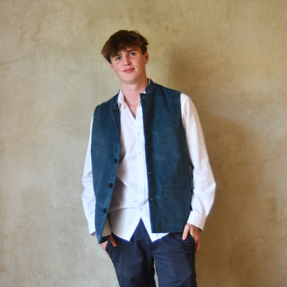 Slim Cut Gilet in Teal Coloured Pure Cotton Corduroy. Handmade in London this Bespoke waistcoat can be ordered with a range of linings and collar types.