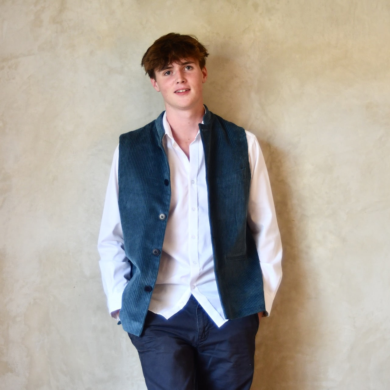 Slim Cut Gilet in Teal Coloured Pure Cotton Corduroy. Handmade in London this Bespoke waistcoat can be ordered with a range of linings and collar types.