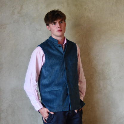 Slim Cut Gilet in Teal Coloured Pure Cotton Corduroy. Handmade in London this Bespoke waistcoat can be ordered with a range of linings and collar types.