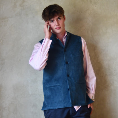 Slim Cut Gilet in Teal Coloured Pure Cotton Corduroy. Handmade in London this Bespoke waistcoat can be ordered with a range of linings and collar types.