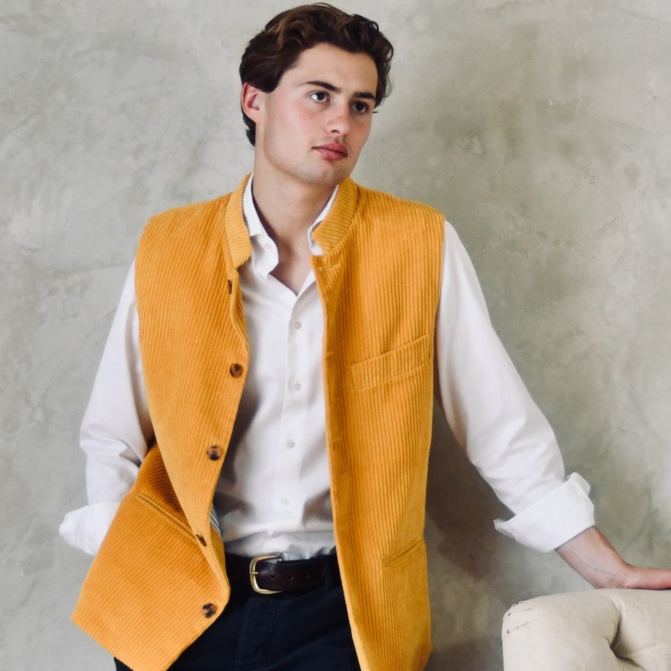 Slim Cut Nehru Gilet in a Rich Ochre Coloured Corduroy. The perfect alternative to a jacket, this gilet will keep you warm and smart in winter. Cut, Made and Finished by Hand in London.