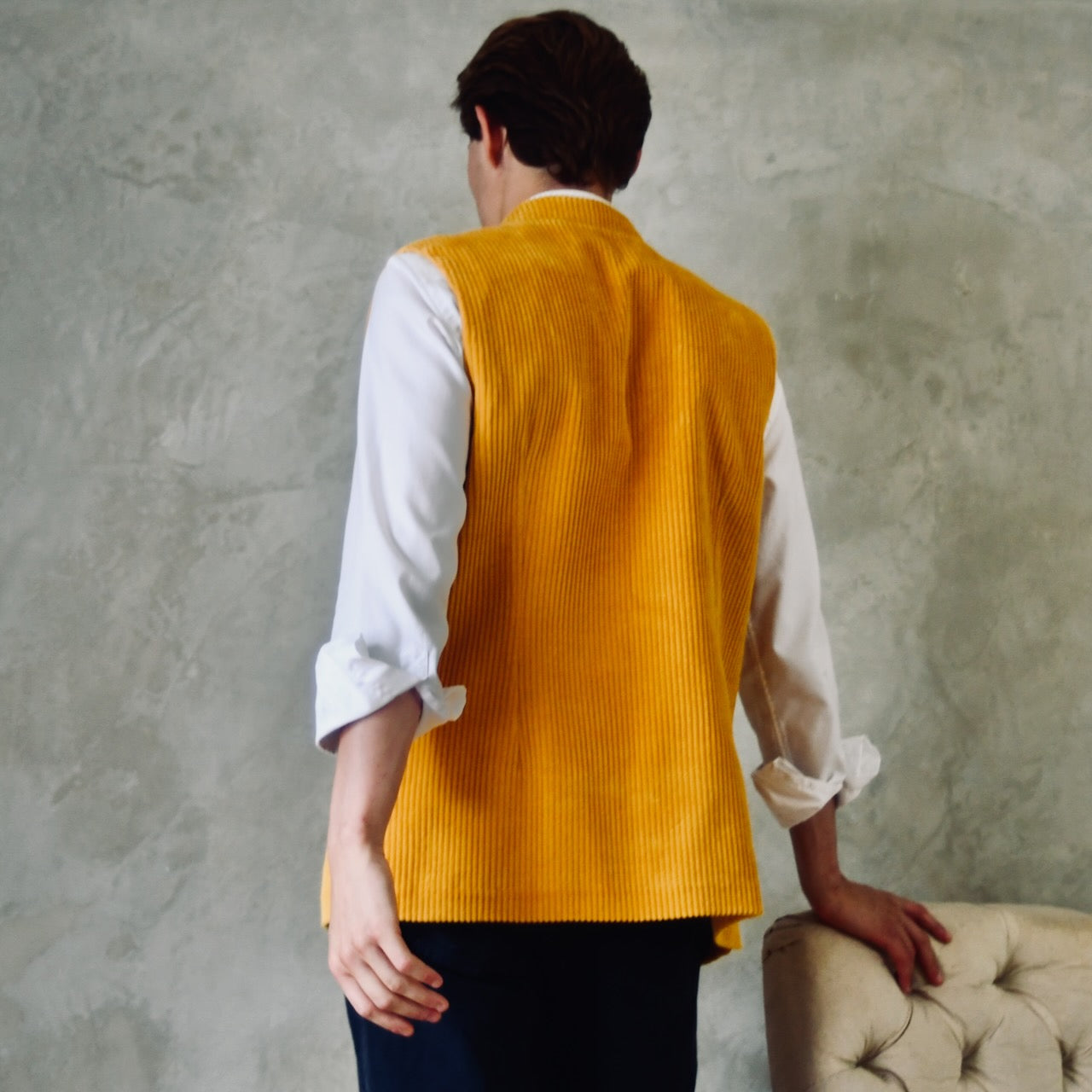 Slim Cut Nehru Gilet in Ochre Coloured Corduroy. The perfect alternative to a jacket, this gilet will keep you warm and smart in winter. Cut, Made and Finished by Hand in London. Rear View showing darts.